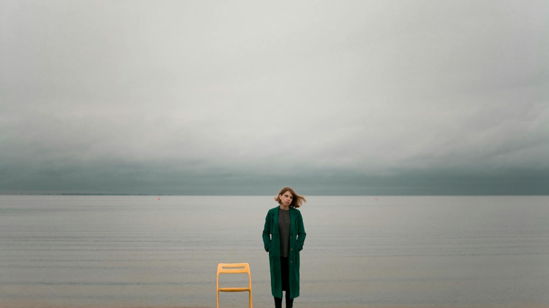 Person focusing on a distant horizon in a calm environment